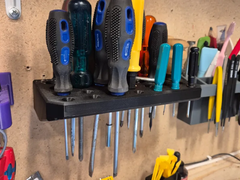 Wall mounted screwdriver holder