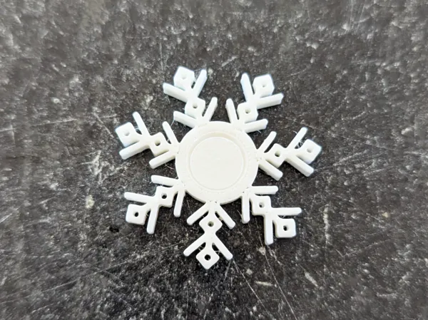 Petit fidget spinner flocon de neige
