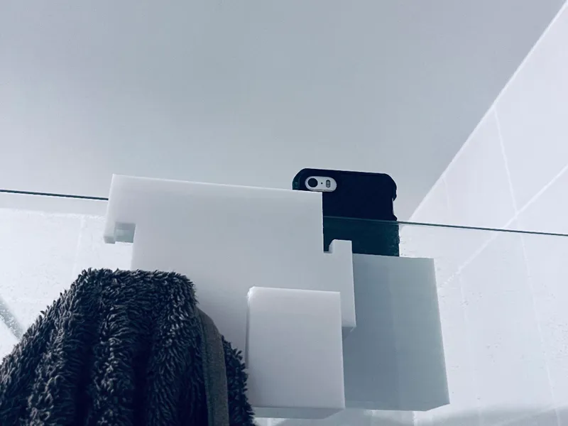 Phone holder and towel