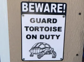 Guard Tortoise on Duty Sign