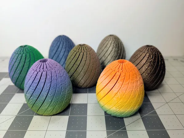 Embossed Twisty Dragon Egg (12 or 20 Slices) - MakerWorld 3D Model | 3Drop