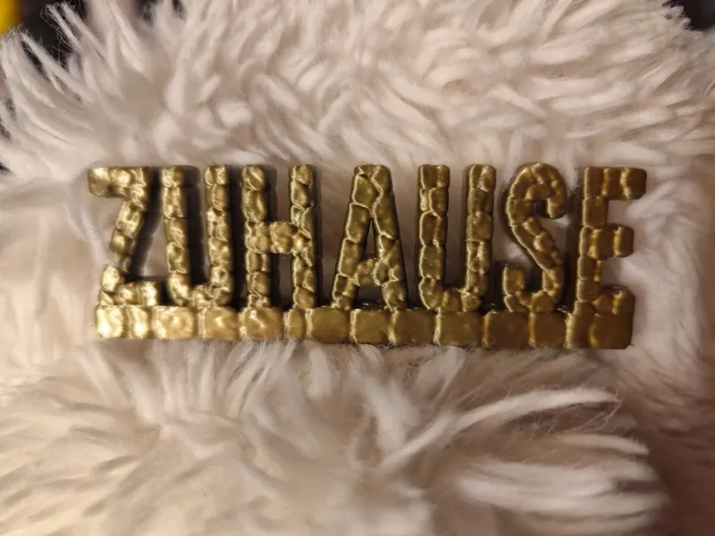 Zuhause Schild in Steinoptik