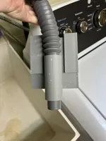Fixation de tuyau de lave-linge pour bac à laver — photo 4