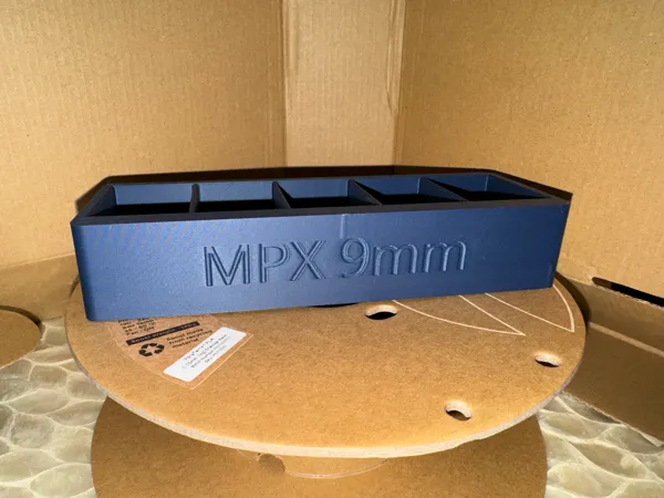 Porte-chargeurs pour rangement en coffre