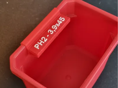 Hardware bin label clip with interchangeable label