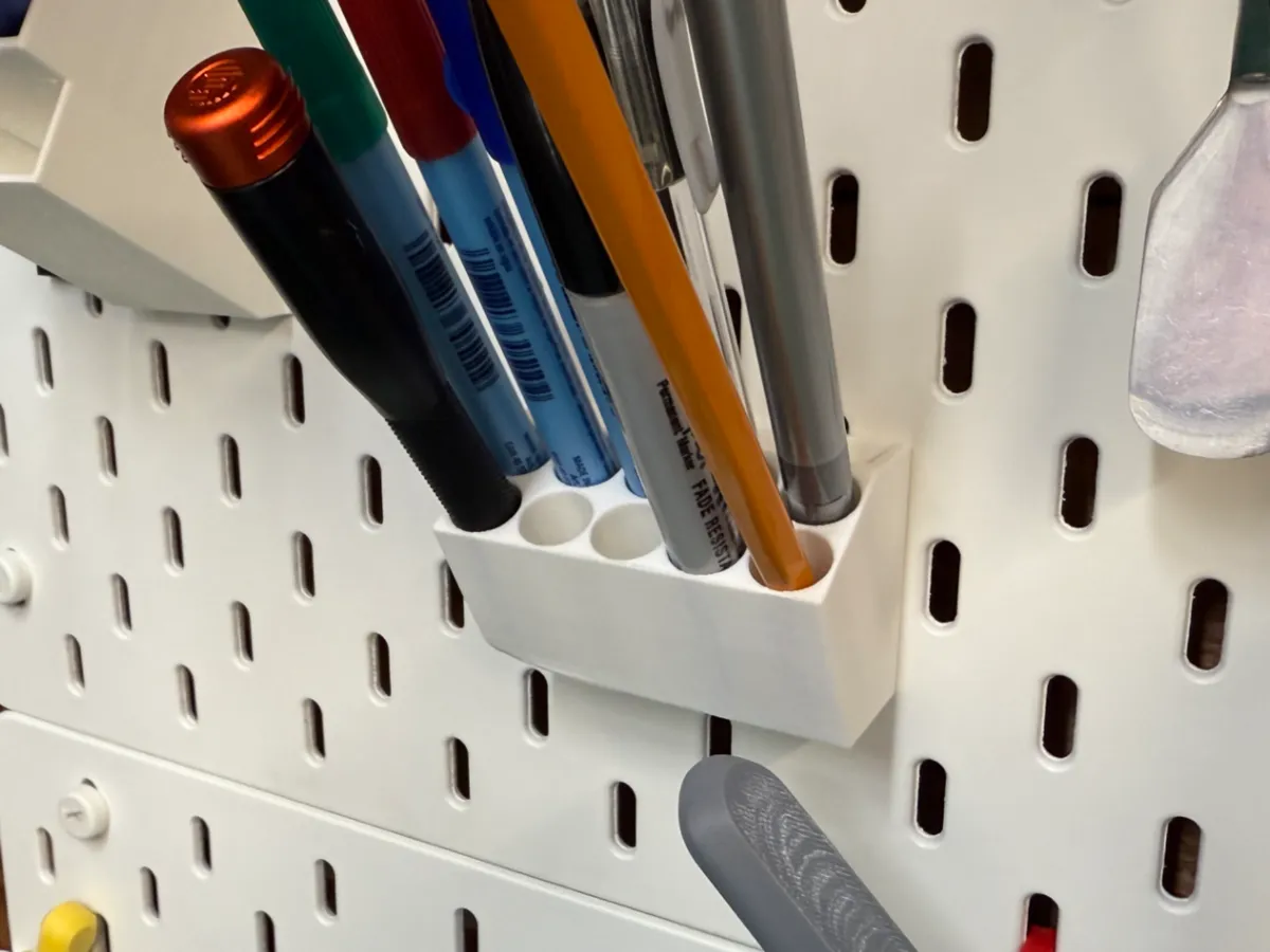 Range-stylos à friction pour panneau Skadis