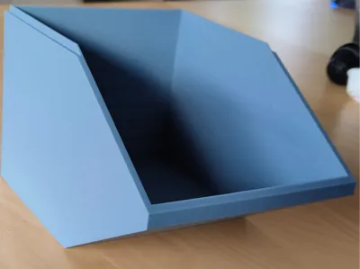 Stackable box with slanted front and lid
