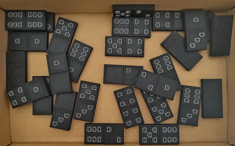 Domino with cat faces