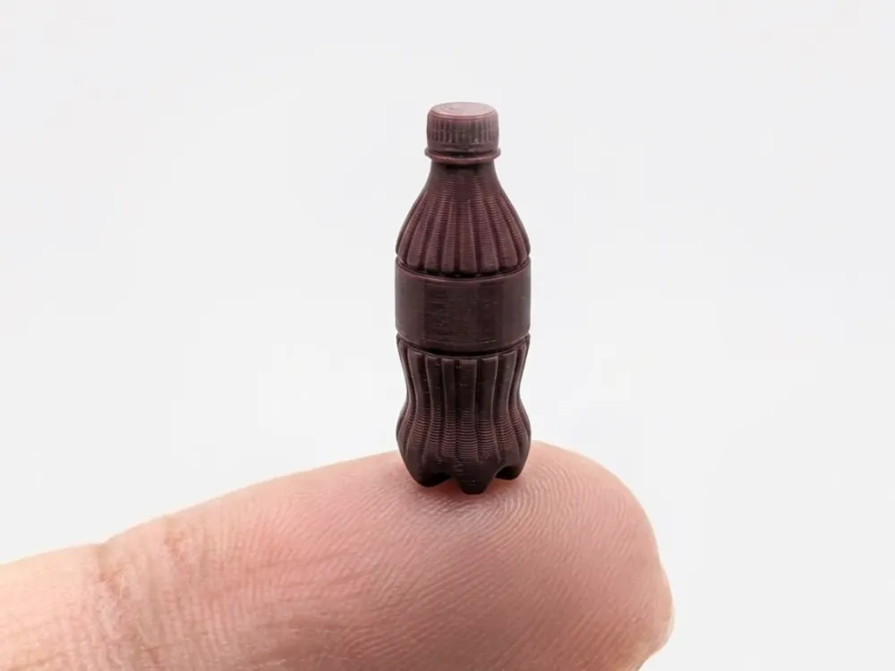 Accesorio para boquillas: The world's smallest Coca-Cola bottle (0.4 nozzle). Referencia del modelo original.