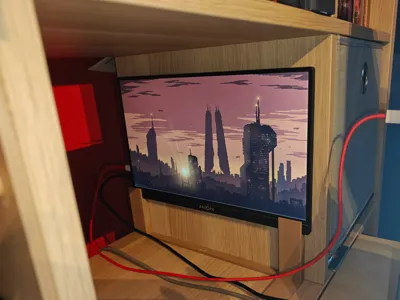 Arzopa monitor aginst the wall stand