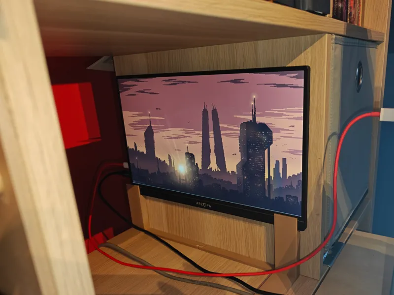 Arzopa monitor aginst the wall stand