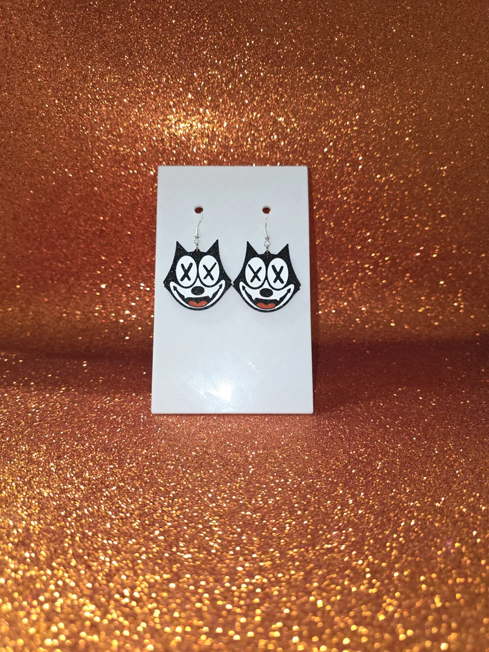 Iconic X-cat dangles earring view 2