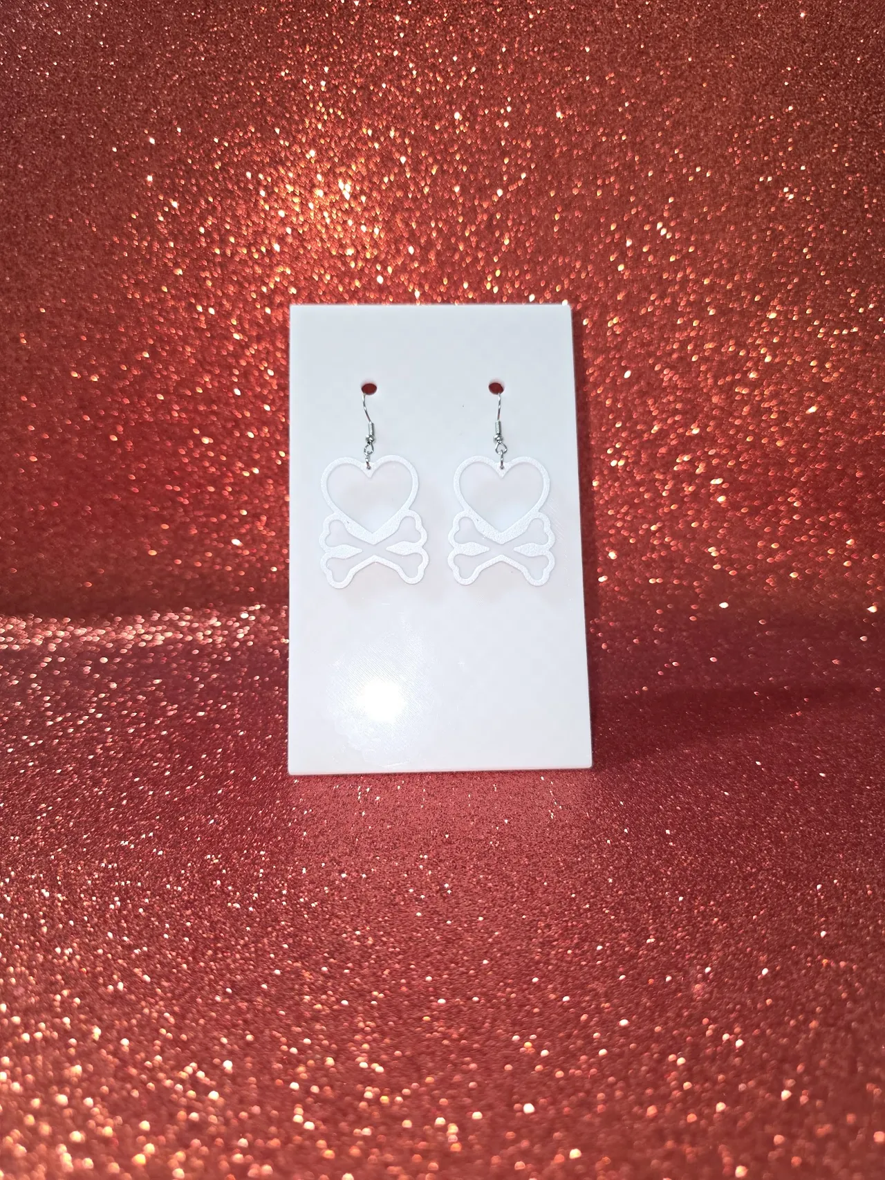 Heart bones earrings view 2