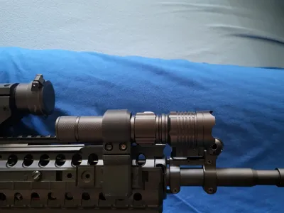 Offset flashlight mount. Diameter 21 mm.