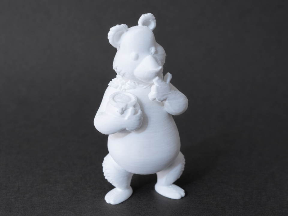 Bear eating honey