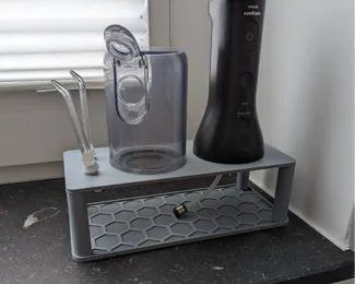 Drying stand for water flosser