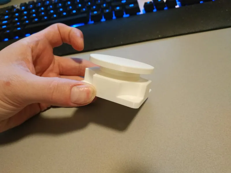 Adjustable foot with screw holes