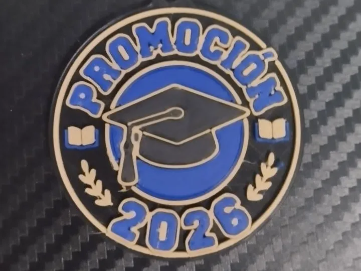 medalla o llavero promocion 2026