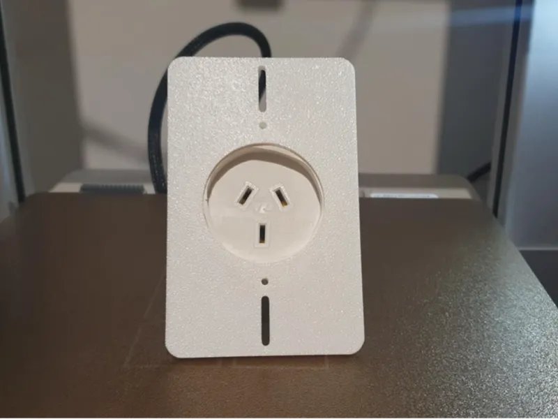 Extension cord wall plate
