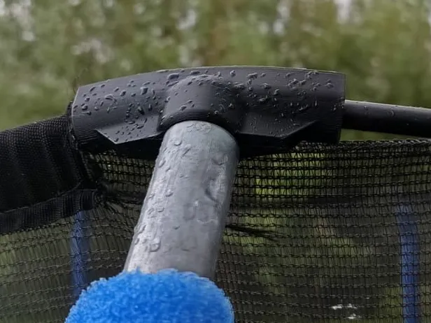 Trampoline net holder