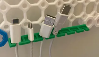 Multiboard USB cable holder