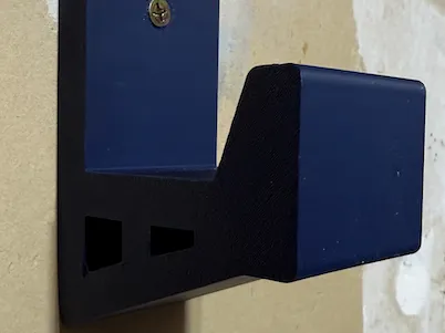 Wall hanger for DeWalt blower