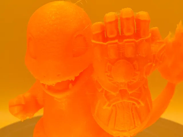 Charmander with Infinity Gauntlet - Public Domain