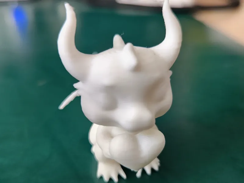 Cute dragon with heart