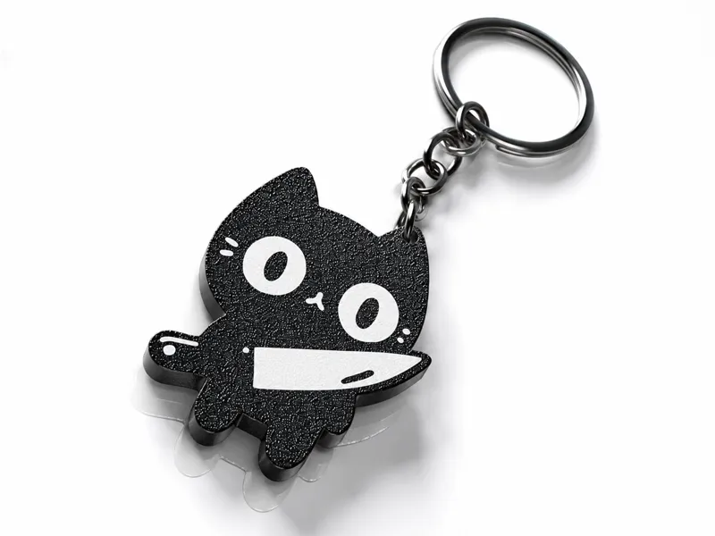 Black cat keychain - Black cat holding a knife