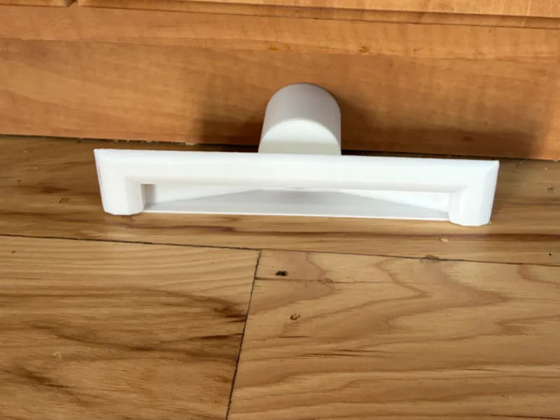 Under-Cabinet Sweep-In Vacuum Port