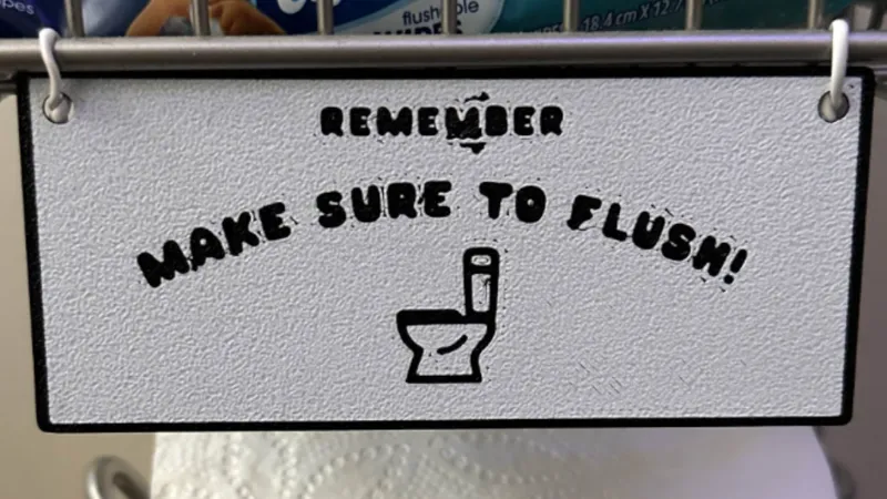 Remember to flush sign 