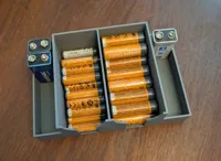 Second side and improvements to fit 9V batteries.