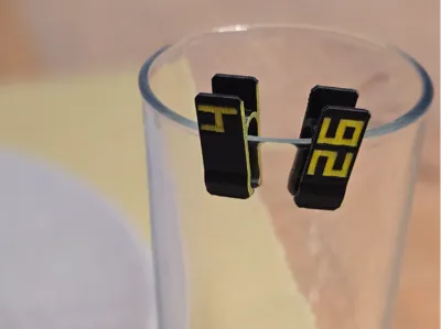 Glass number bracket