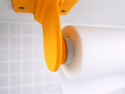 Under cabinet holder for large foil & wrap