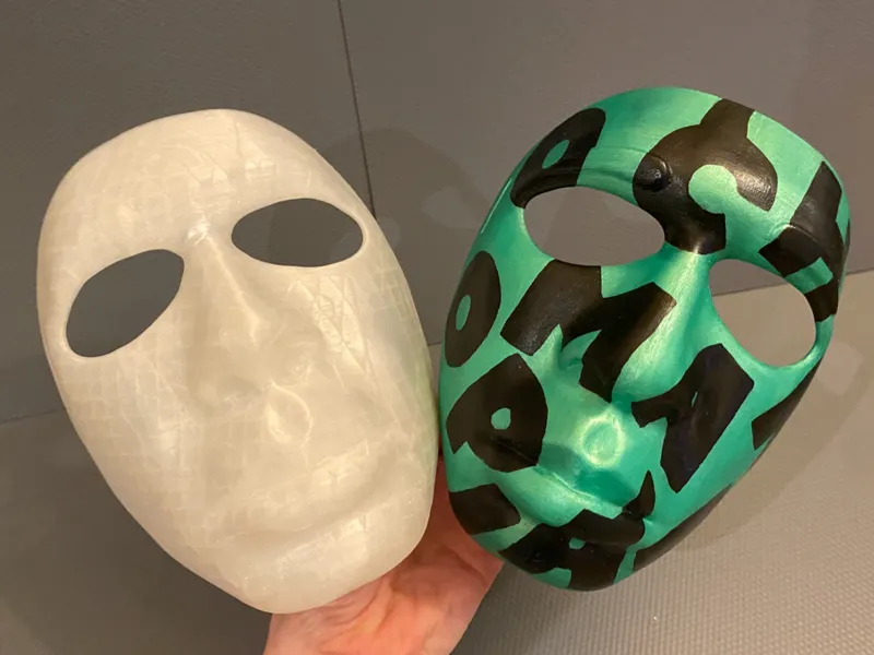 Chromakopia mask with letters of CHROMAKOPIA on it