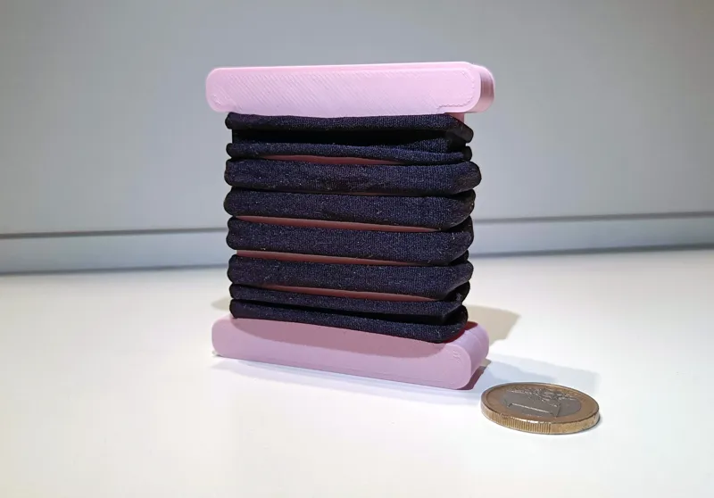 Hair tie holder