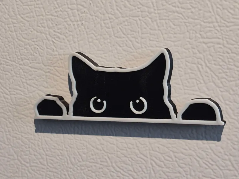 Cat peeking fridge magnet