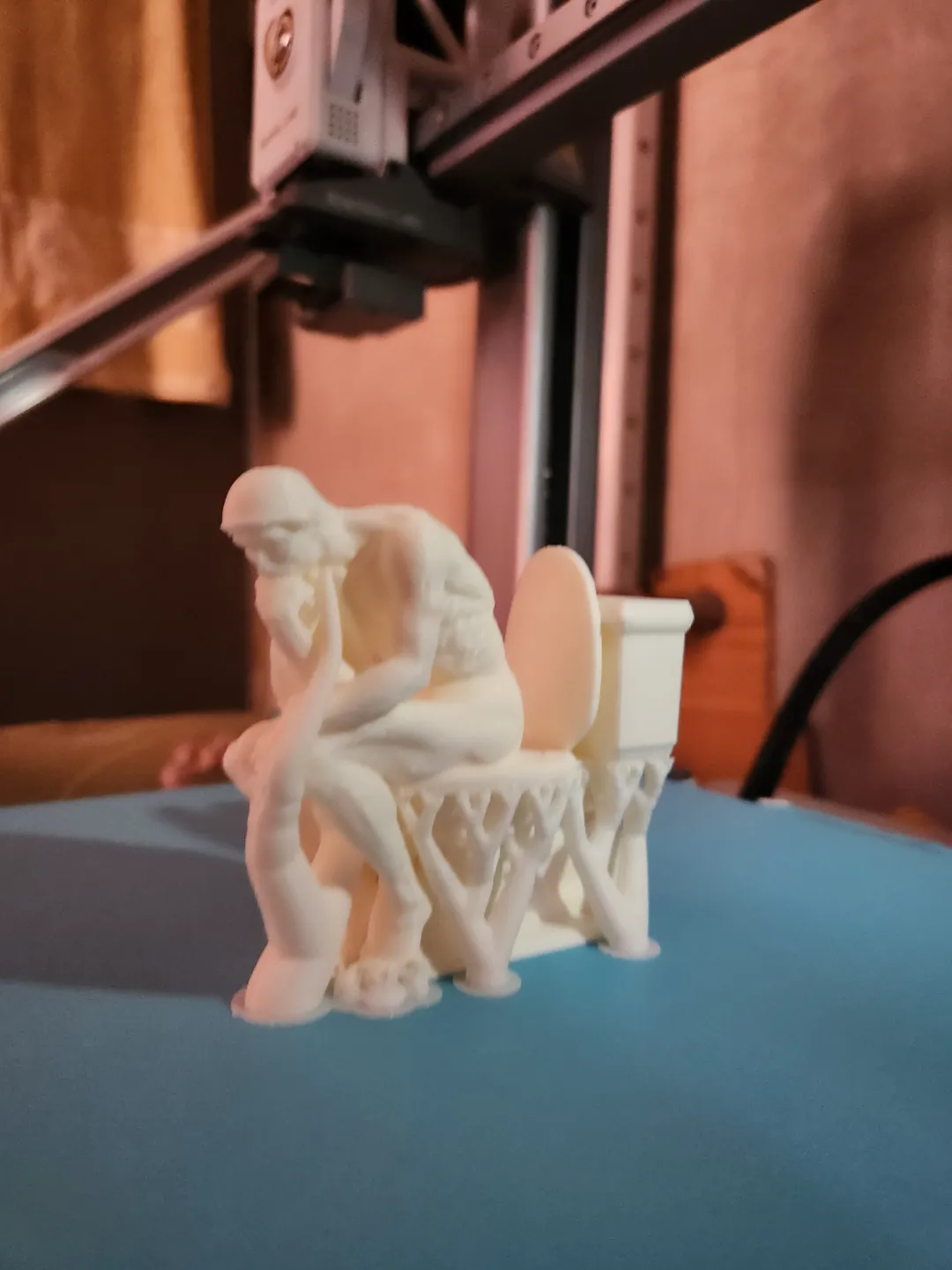 the Thinker on the toilet view 3
