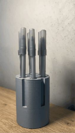 Revolver pen holder fidget