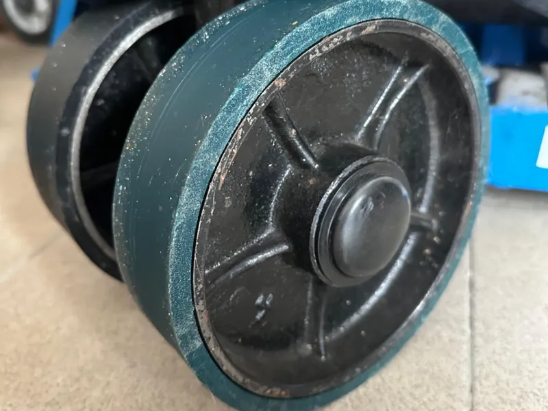 Wheel covers for pallet trucks