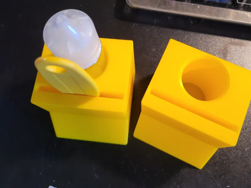 Glue Station, holds bottle and spreader