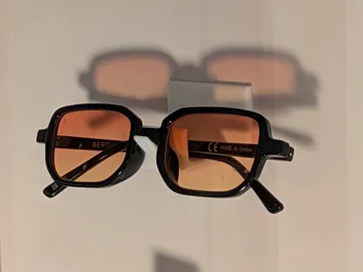 Magnetic / double-sided tape sunglasses holder