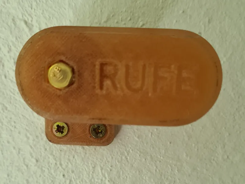 Lever for wall mounting flat(ish) objects