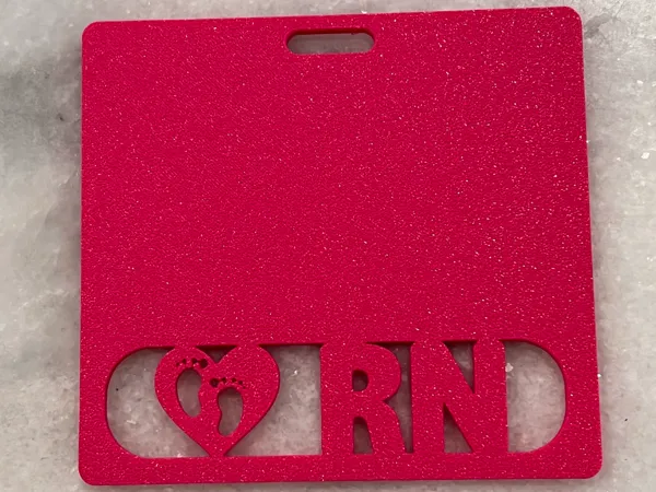 Badge infirmière empreintes de bébé