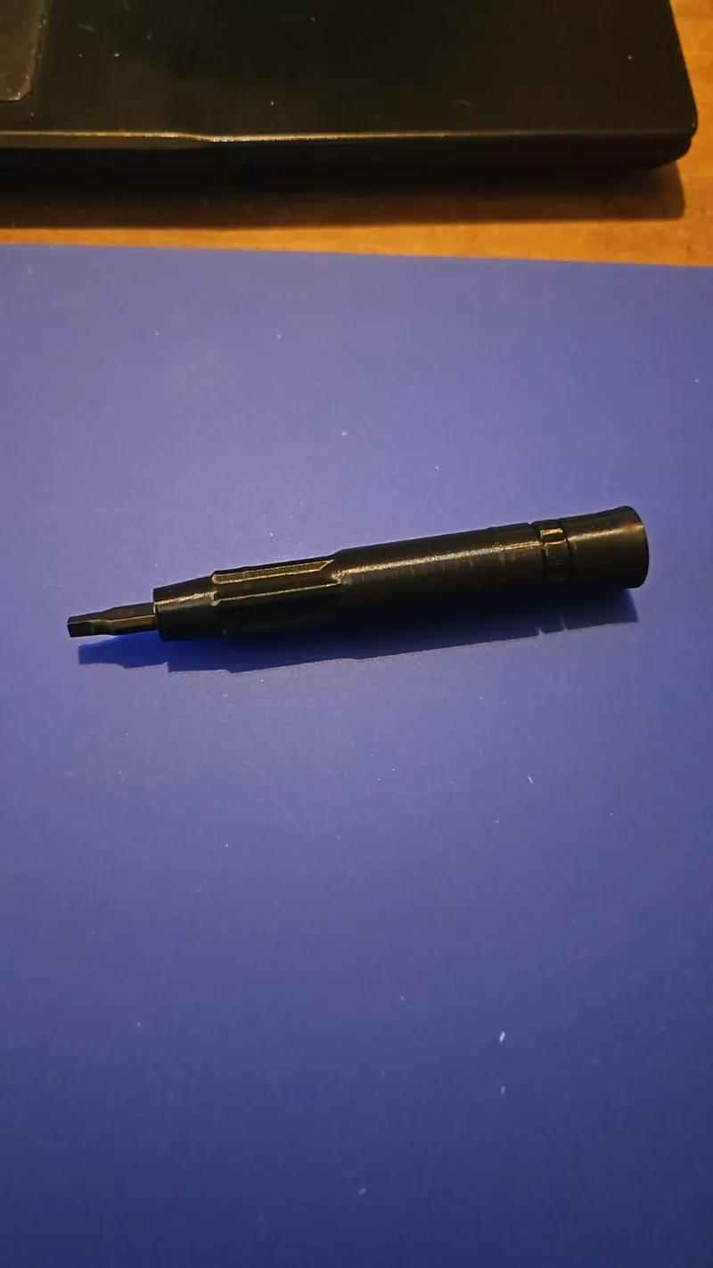 screwdriver for leatherman bits with bit storage in handle and free spinning end