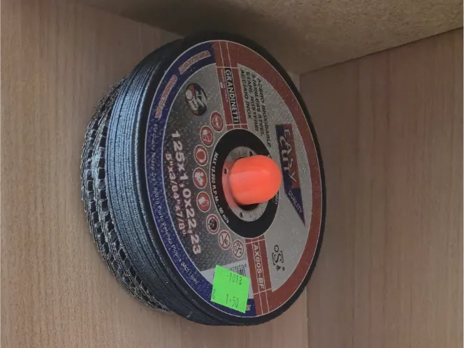 Minimalistic angle grinder wall disc holder