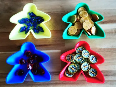 Meeple shaped stackable board game resource tray