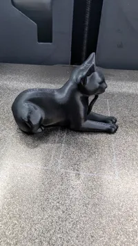 Figurine chat noir allongé — photo 2