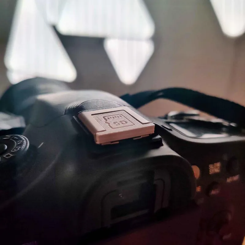 Camera hot shoe with SD card storage