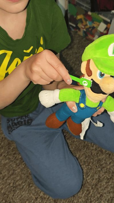 Toy toothbrush (Mario, Luigi)